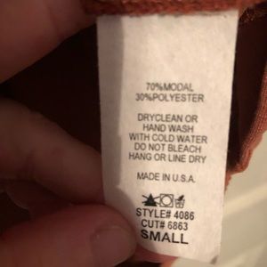 Burnt orange boutique 3/4 sleeve shirt.